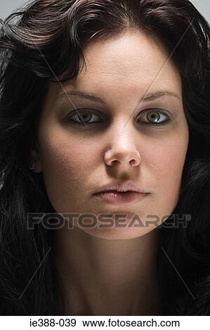 Stock Photo - Portrait of a young woman. Fotosearch