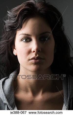 Portrait of a young woman View Large Photo Image Stock Photo - Portrait of a young woman. Fotosearch