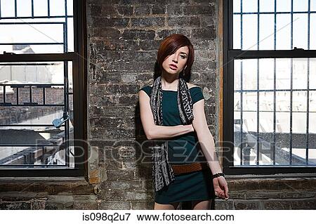 Portrait of a young woman View Large Photo Image Stock Photo - Portrait of a young woman. Fotosearch