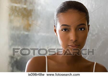 Portrait of a young woman View Large Photo Image Stock Photo - Portrait of a young woman. Fotosearch