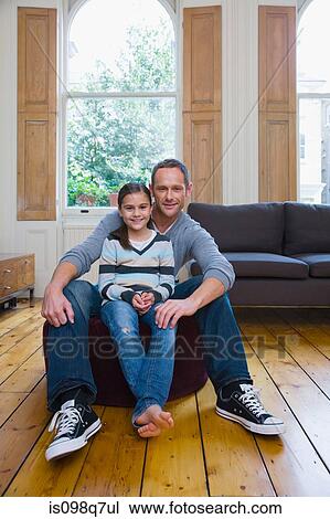 Stock Image - Portrait of father and son. Fotosearch