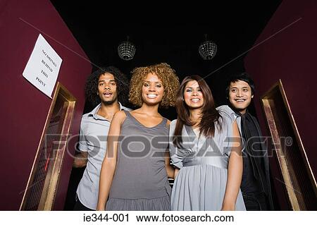 Portrait of friends in a nightclub View Large Photo Image Stock Image - Portrait of friends in a nightclub. Fotosearch