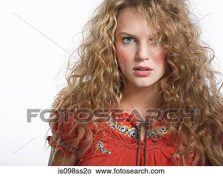 Picture - Portrait of serious young blonde woman. Fotosearch