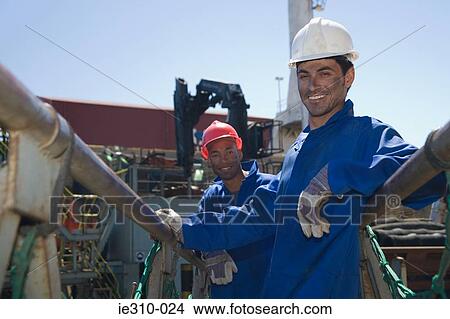 Portrait of two harbour workers View Large Photo Image Picture - Portrait of two harbour workers. Fotosearch