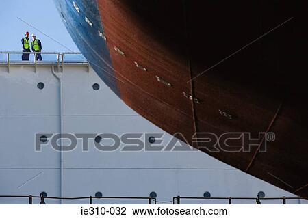 Portrait of two harbour workers View Large Photo Image Stock Image - Portrait of two harbour workers. Fotosearch