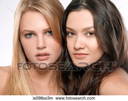 Picture - Portrait of two young women side by side. Fotosearch