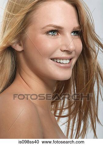 Stock Image - Portrait of young blonde woman. Fotosearch