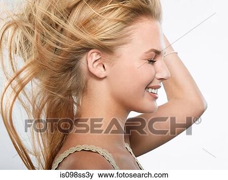Stock Photo - Portrait of young blonde woman. Fotosearch