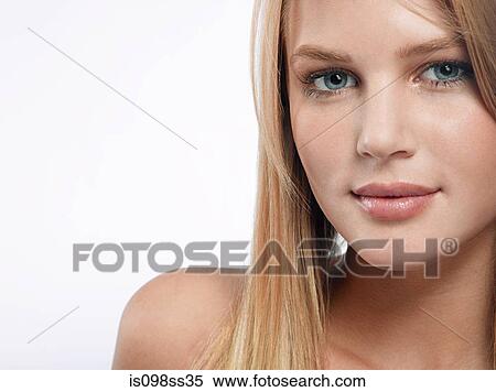 Stock Photography - Portrait of young blonde woman. Fotosearch