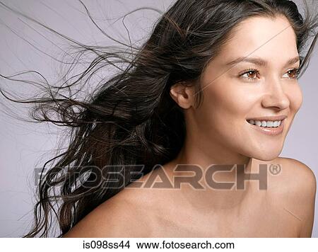 Picture - Portrait of young brunette woman. Fotosearch