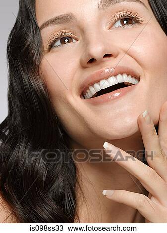Portrait of young brunette woman View Large Photo Image Stock Image - Portrait of young brunette woman. Fotosearch