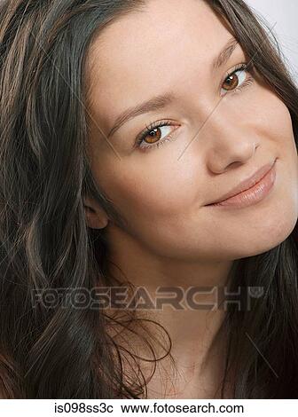 Portrait of young brunette woman View Large Photo Image Stock Image - Portrait of young brunette woman. Fotosearch