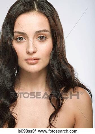 Stock Image - Portrait of young brunette woman. Fotosearch