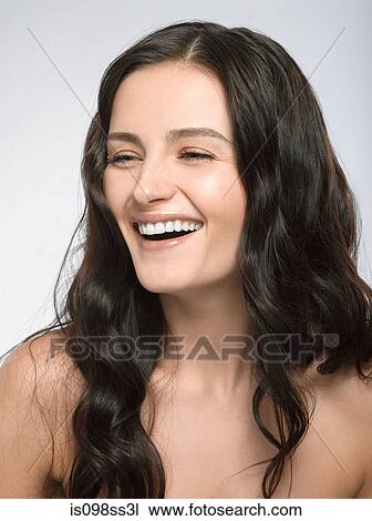 Stock Image - Portrait of young brunette woman. Fotosearch