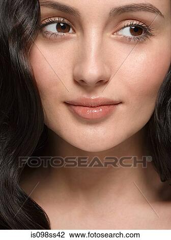 Stock Image - Portrait of young brunette woman. Fotosearch