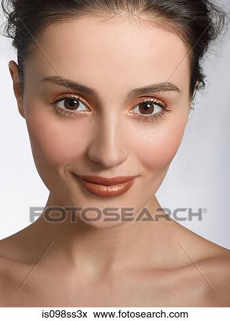 Stock Photo - Portrait of young brunette woman. Fotosearch