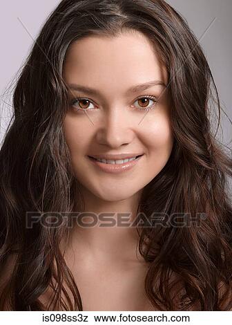 Portrait of young brunette woman View Large Photo Image Stock Photo - Portrait of young brunette woman. Fotosearch