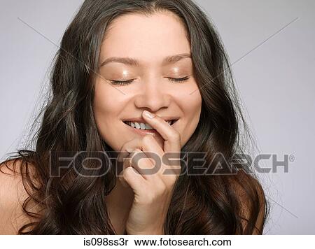 Portrait of young brunette woman View Large Photo Image Stock Photography - Portrait of young brunette woman. Fotosearch