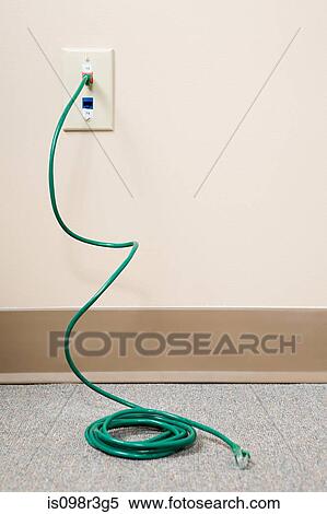 Power cable coming out of socket View Large Photo Image Stock Photography - Power cable coming out of socket. Fotosearch