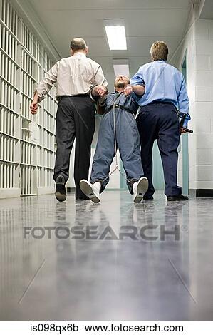 Prisoner being dragged down corridor View Large Photo Image Stock Image - Prisoner being dragged down corridor. Fotosearch