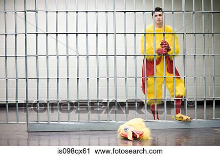Prisoner in chicken suit View Large Photo Image Stock Image - Prisoner in chicken suit. Fotosearch