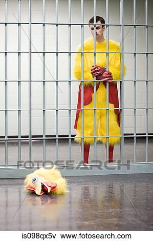 Prisoner in chicken suit View Large Photo Image Stock Photo - Prisoner in chicken suit. Fotosearch