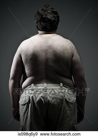 Stock Photo - Rear view of overweight man. Fotosearch