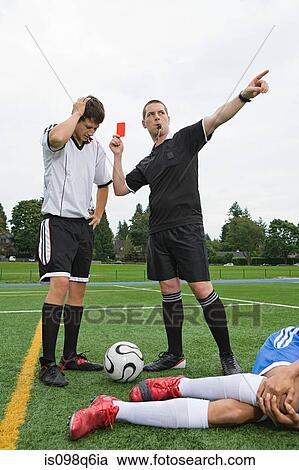 Referee giving red card View Large Photo Image Stock Image - Referee giving red card. Fotosearch