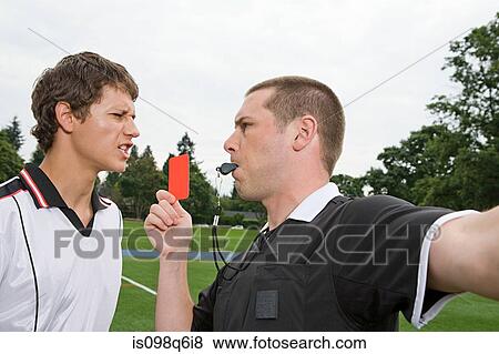 Referee giving red card View Large Photo Image Stock Photo - Referee giving red card. Fotosearch