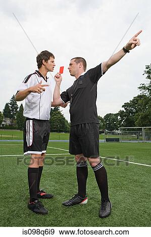 Referee giving red card View Large Photo Image Stock Photo - Referee giving red card. Fotosearch