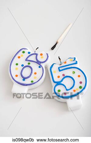 Stock Image - Retirement birthday candles. Fotosearch