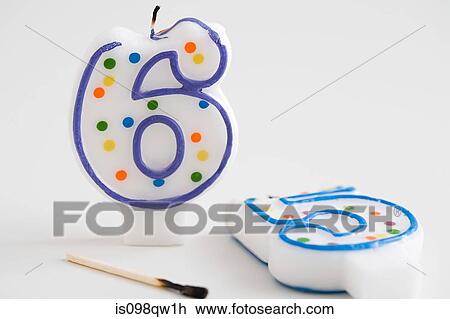Stock Image - Retirement birthday candles. Fotosearch