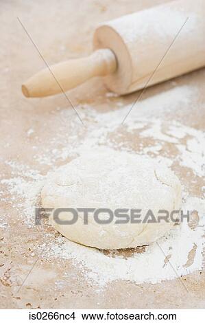 Rolling pin and dough View Large Photo Image Picture - Rolling pin and dough. Fotosearch