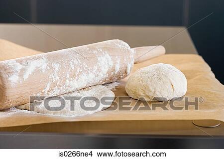 Picture - Rolling pin and dough. Fotosearch