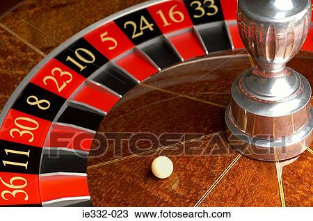 Roulette wheel and ball View Large Photo Image Stock Image - Roulette wheel and ball. Fotosearch