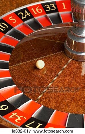 Roulette wheel and ball View Large Photo Image Stock Photo - Roulette wheel and ball. Fotosearch
