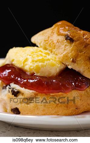 Scone jam and cream View Large Photo Image Stock Photo - Scone jam and cream. Fotosearch