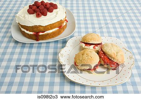 Scones and sponge cake View Large Photo Image Stock Image - Scones and sponge cake. Fotosearch