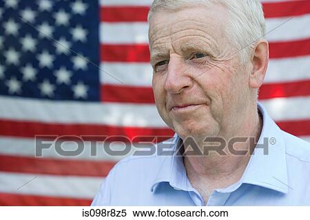 Stock Photography - Senior man and and american flag. Fotosearch