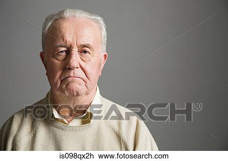 Senior man frowning View Large Photo Image Stock Image - Senior man frowning. Fotosearch