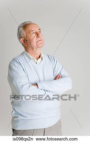 Picture - Senior man looking up. Fotosearch