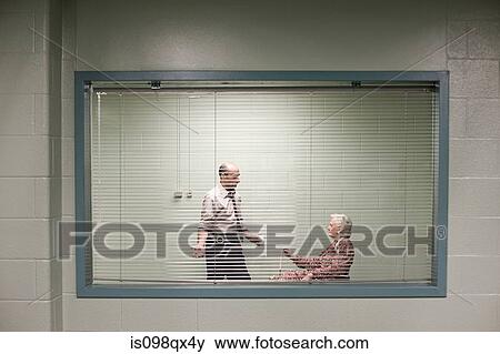 Senior woman being questioned View Large Photo Image Stock Photo - Senior woman being questioned. Fotosearch