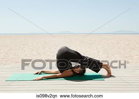 Senior woman doing yoga on beach View Large Photo Image Picture - Senior woman doing yoga on beach. Fotosearch