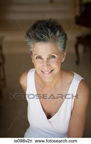 Stock Image - Senior woman, portrait. Fotosearch