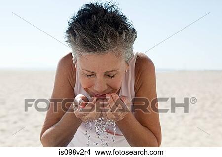 Senior woman washing face View Large Photo Image Picture - Senior woman washing face. Fotosearch