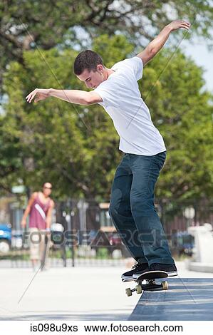 Skateboarder at skate park View Large Photo Image Stock Photograph - Skateboarder at skate park. Fotosearch