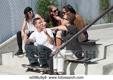 Skateboarders hanging out on on steps View Large Photo Image Stock Photo - Skateboarders hanging out on on steps. Fotosearch