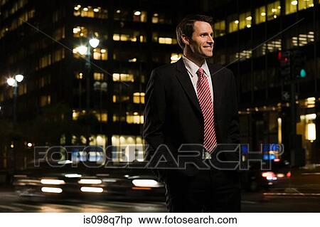 Stock Photography - Smiling businessman in the road. Fotosearch