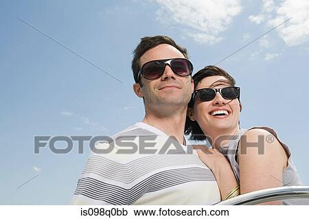 Stock Image - Smiling couple on vacation. Fotosearch