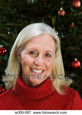 Stock Photo - Smiling mature woman. Fotosearch